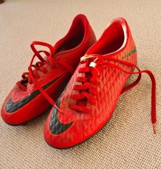Nike red boots size 4