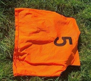 14 orange numbered bibs