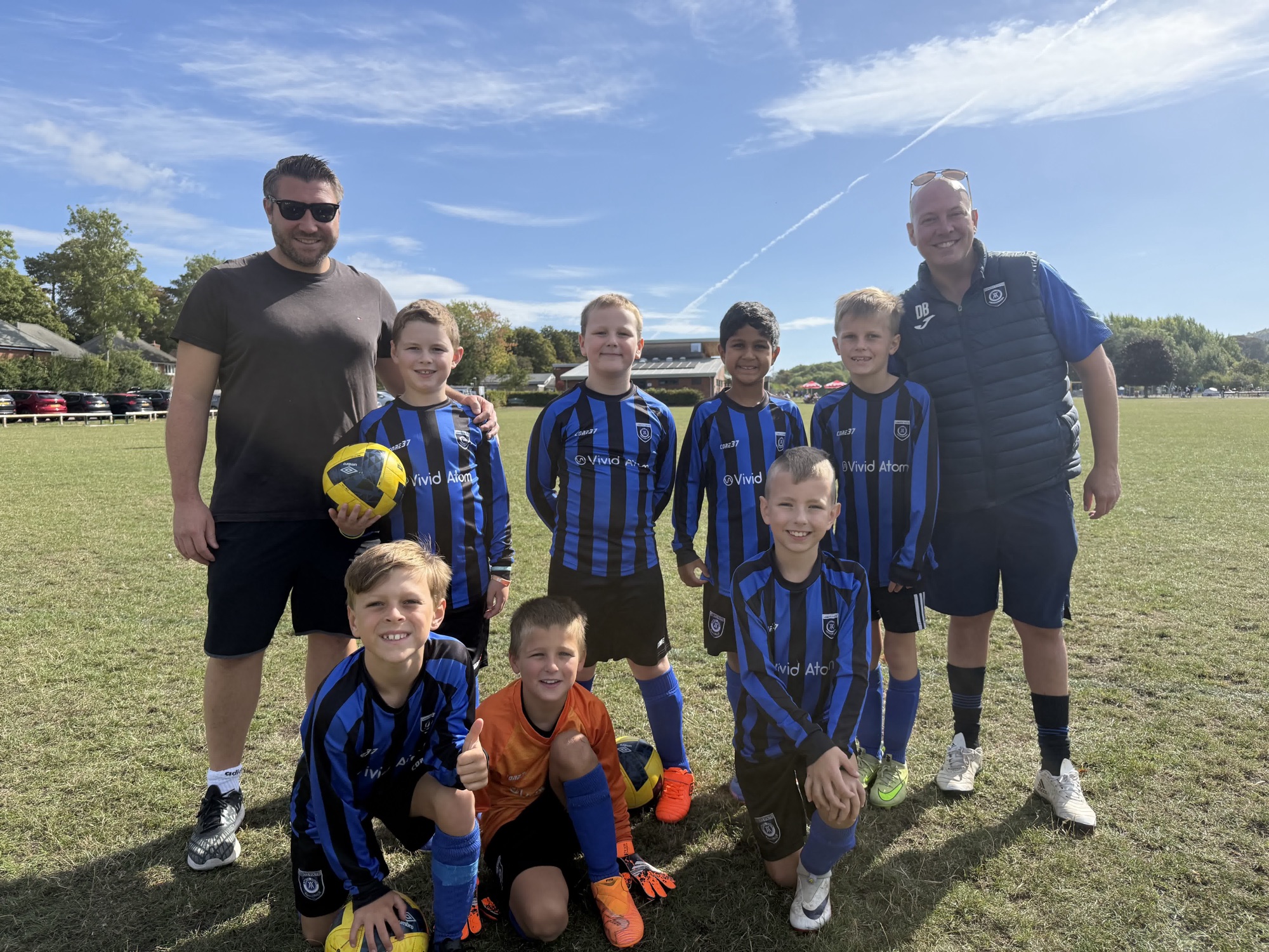 Under 9 Red celebrate winning the Evergreen tournament